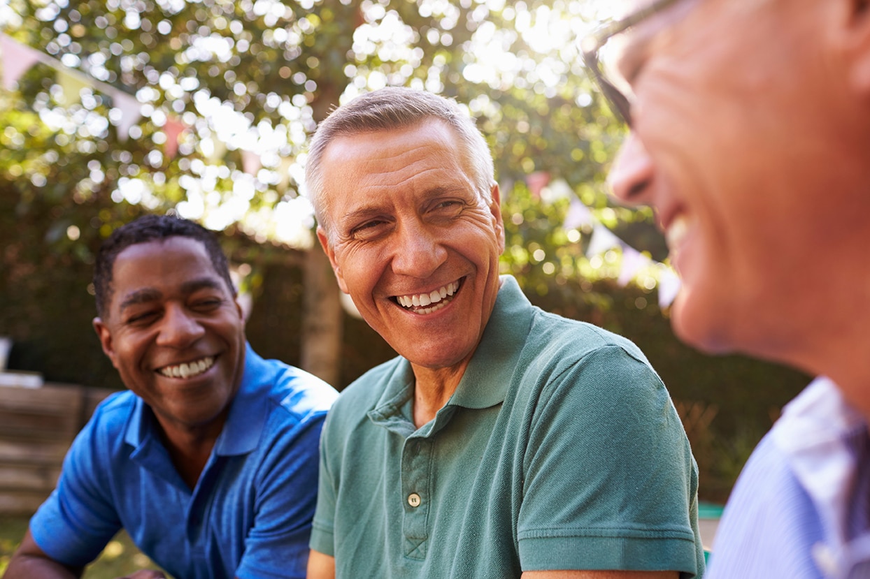 three older men laughing after a dental cleaning at prosper dental studio