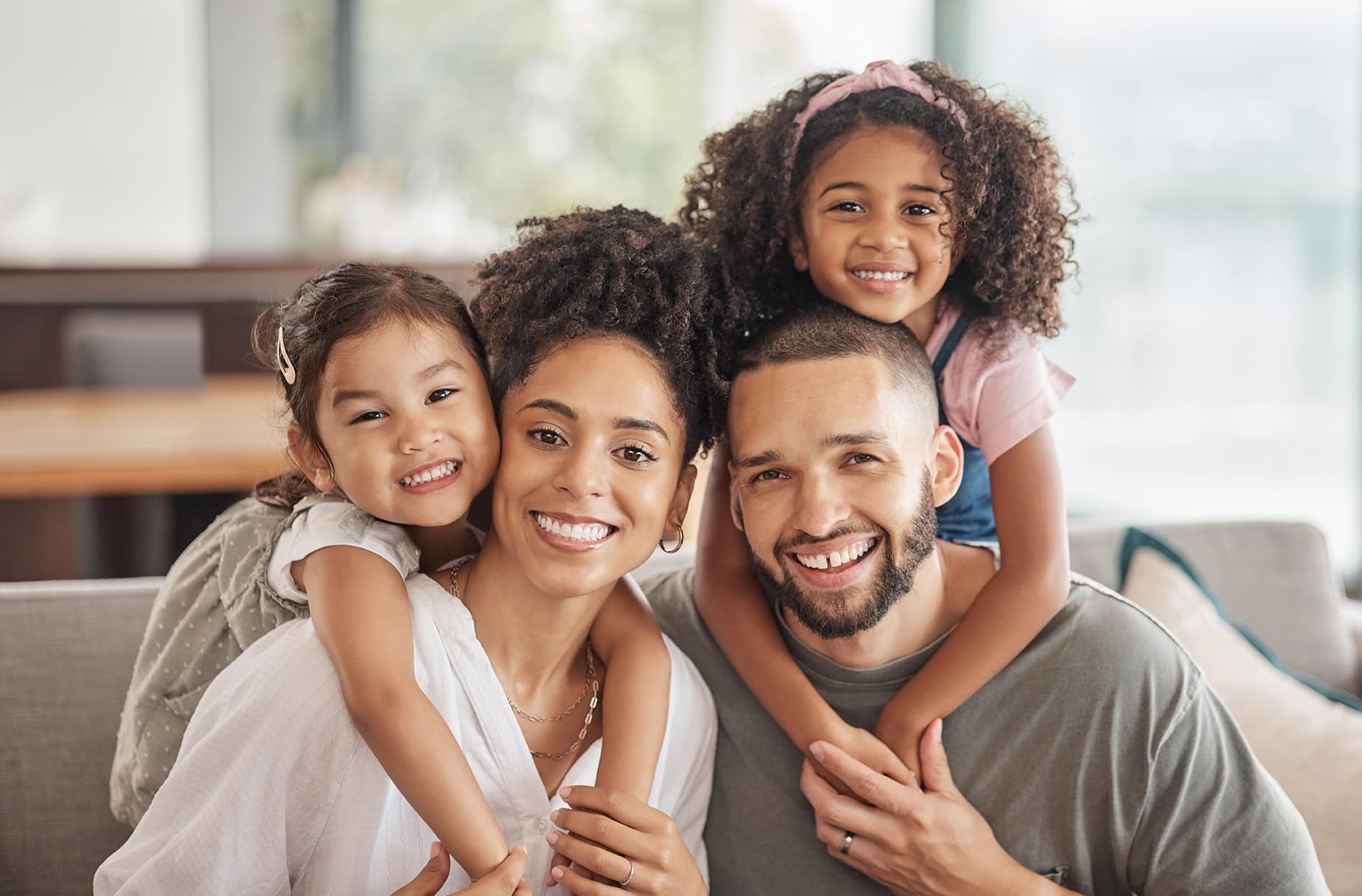 family smiling in Cornelius NC