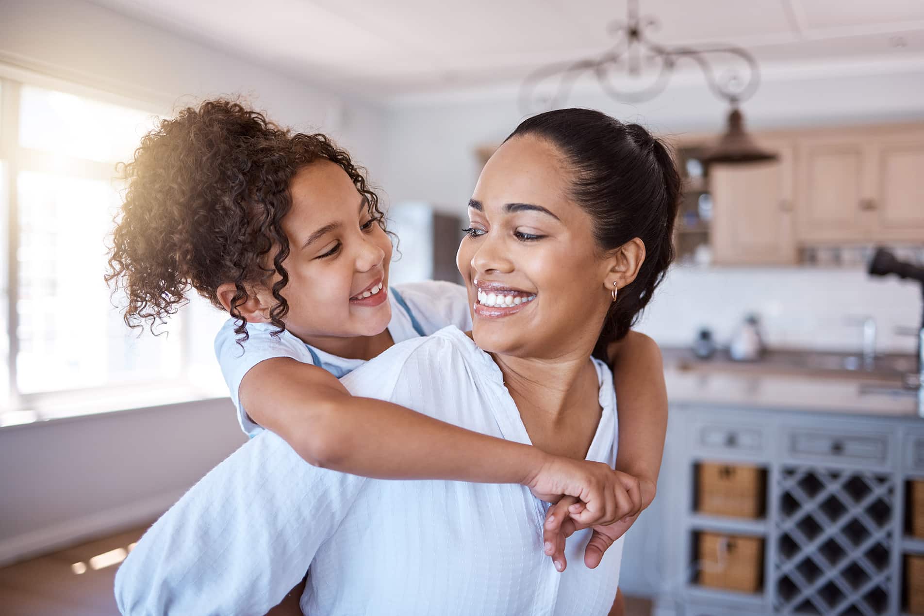 mother and daughter smiling in Cornelius NC