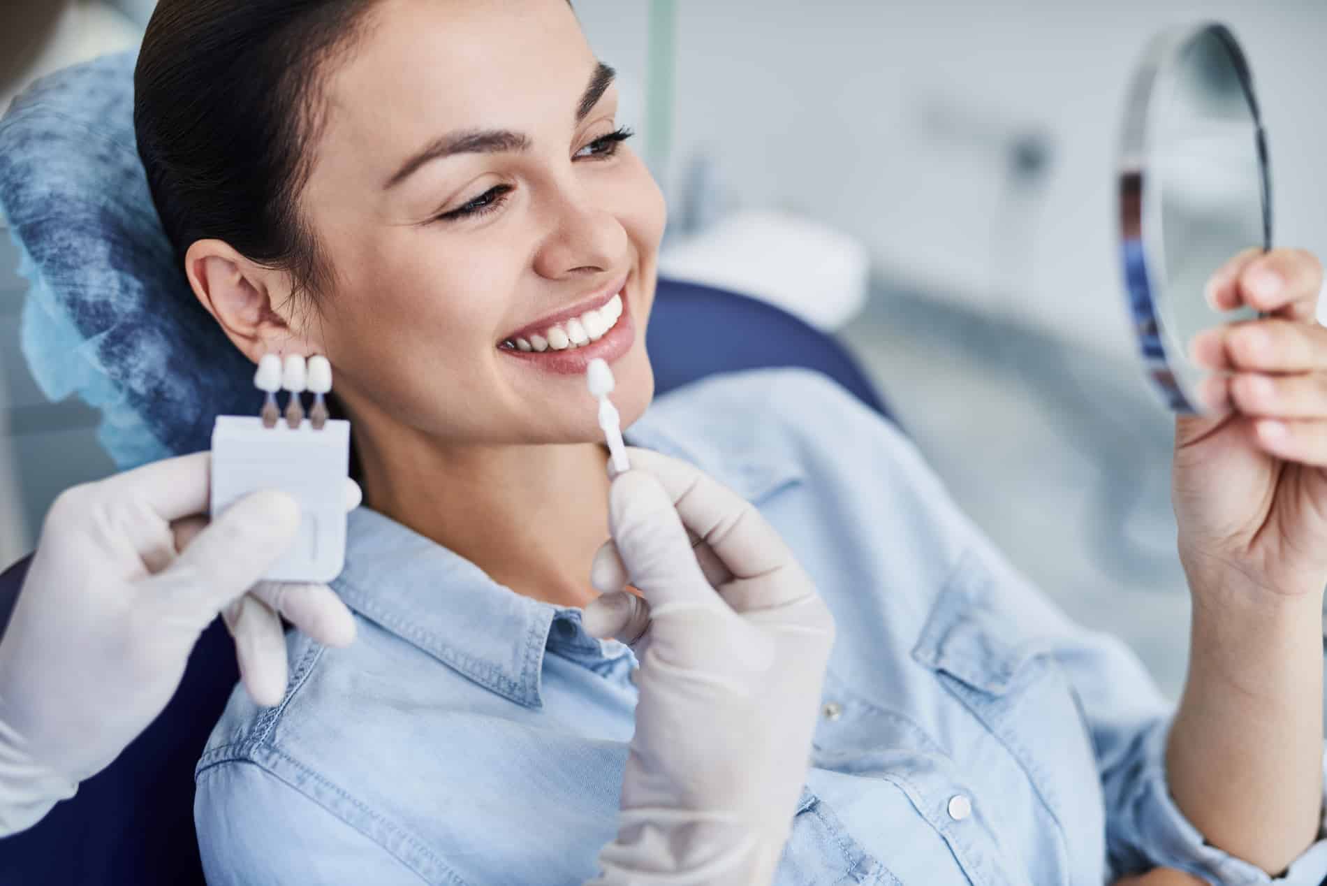 Woman discussing her smile design plan with Dr. Chica in Cornelius