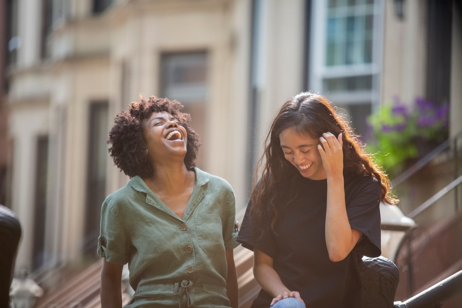 Women laugh together with healthy smikes in Huntersville NC